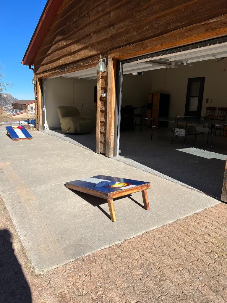 Cornhole game in the additional outdoor space