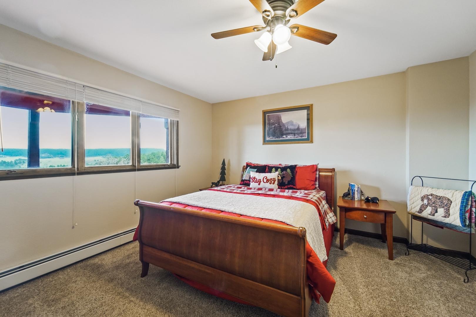 Bear Room — cozy bedroom with queen bed and Colorado mesa views